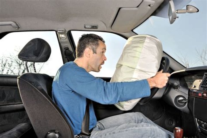 Can an airbag break your back?