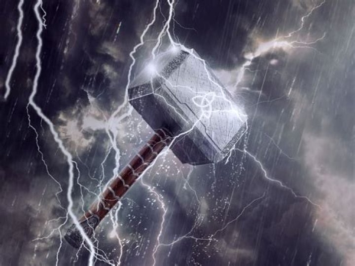 Can Iron Man hold Thor's hammer?