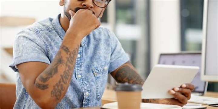 Can my employer ask me to cover tattoos?