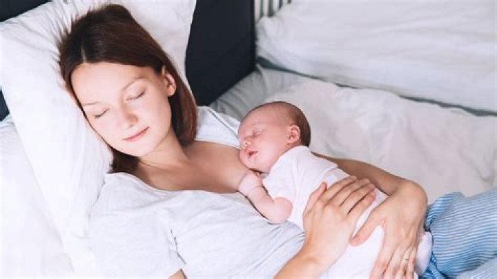 Can newborn sleep with Mom?