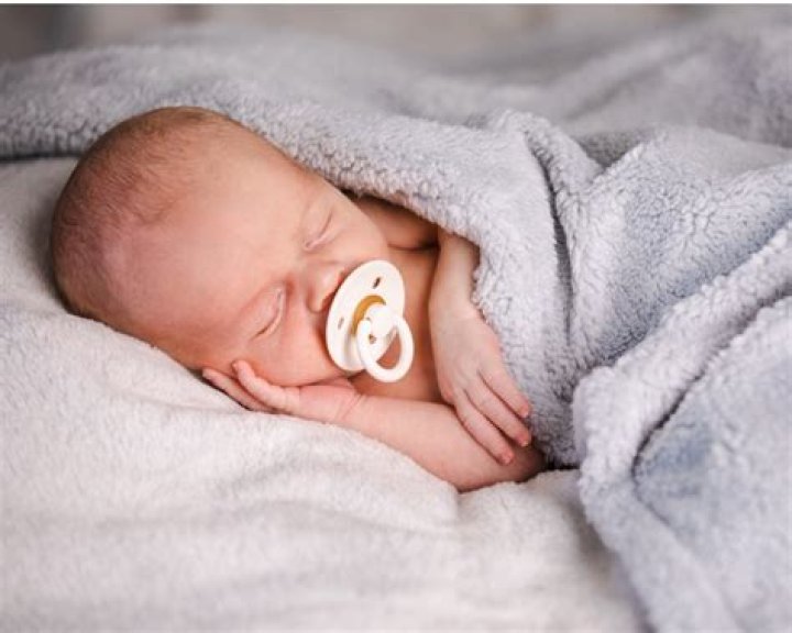 Can you leave a pacifier in a baby's mouth while sleeping?