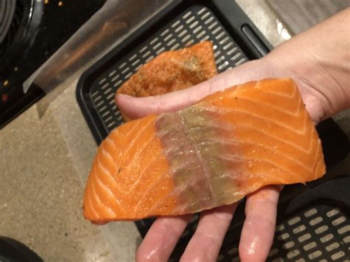 Do you have to wash salmon before cooking?