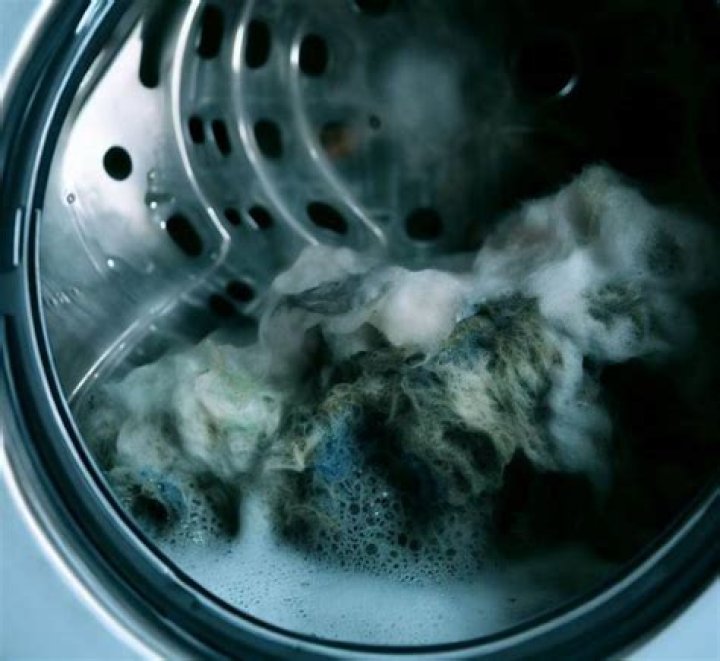 Does fabric softener cause mold in washing machine?