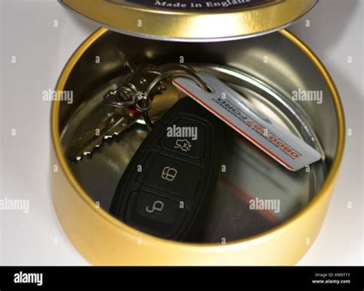 Does putting car keys in a tin block the signal?