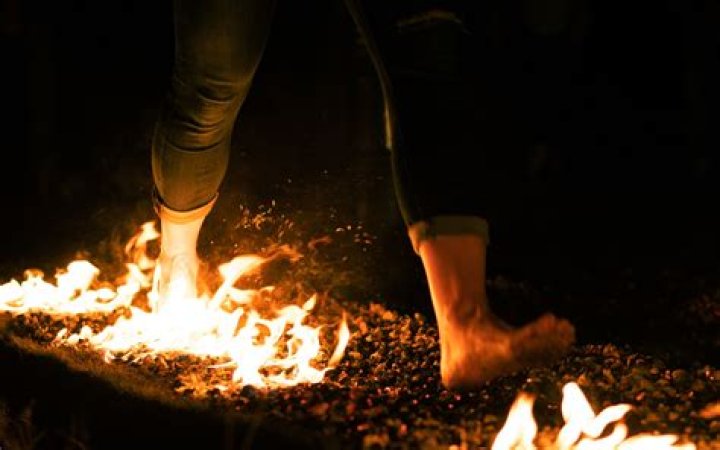 Does walking on fire burn your feet?