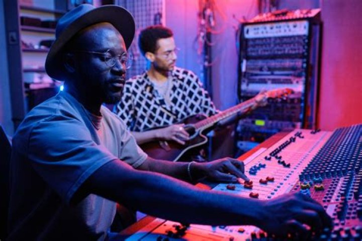 How do music producers get famous?
