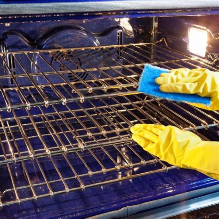 How do professionals clean oven racks?