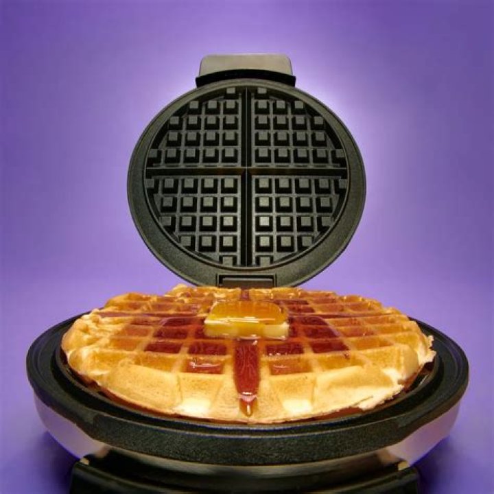 How do you clean old oil off a waffle iron?