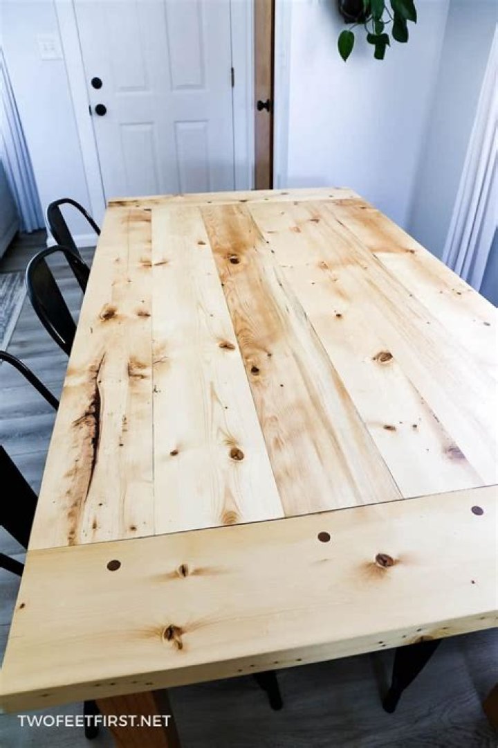 How do you maintain a solid wood table?