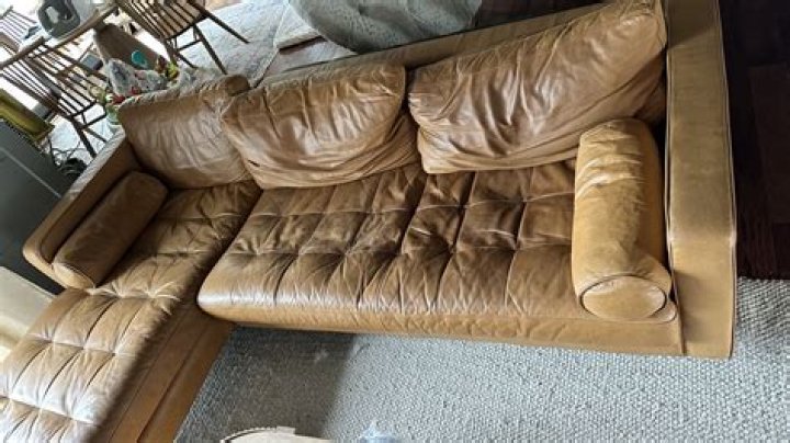 How do you make an old couch look modern?