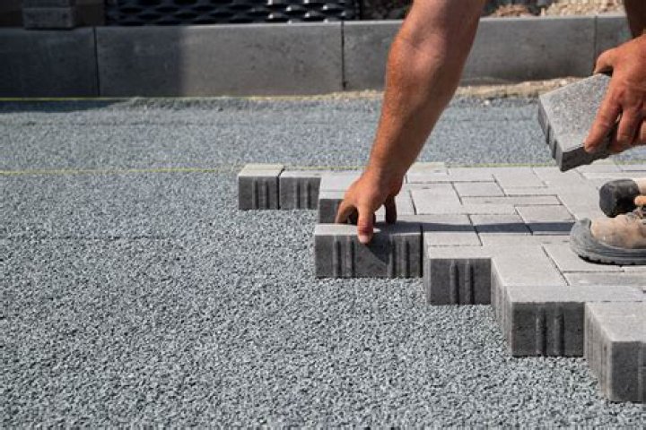 Is polymeric sand better than regular sand?