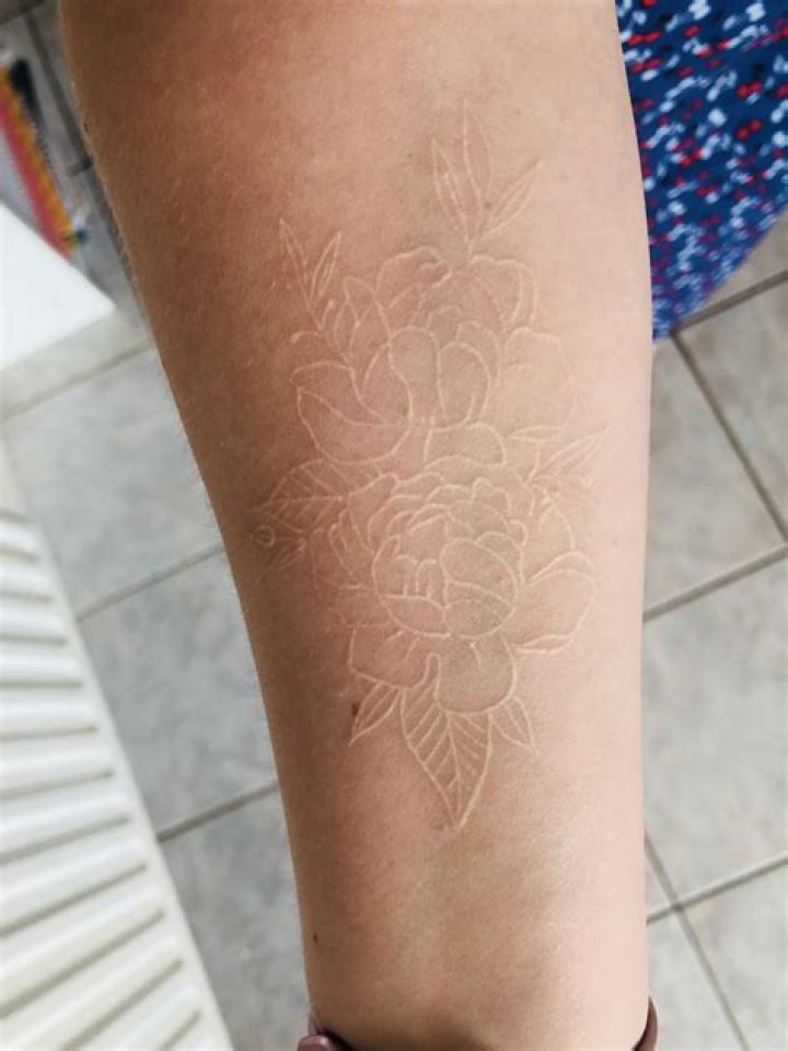 Is white tattoo ink more painful?
