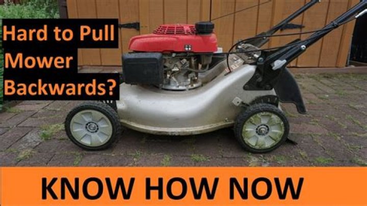 What causes a lawn mower hard to pull?
