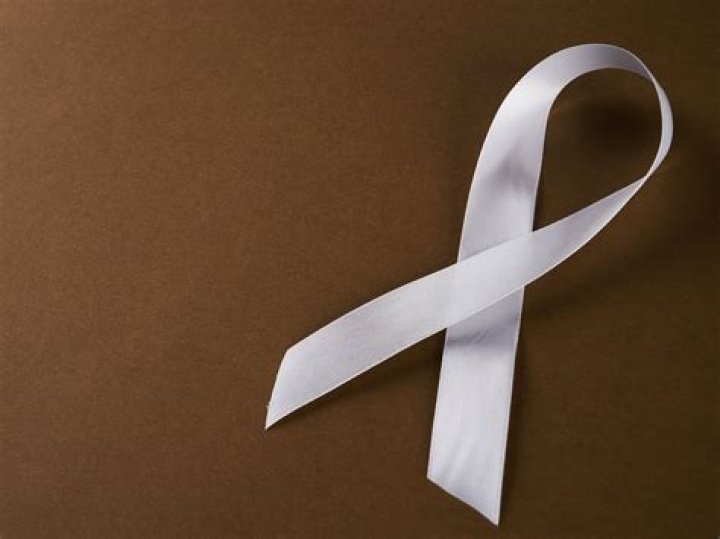 What does a white ribbon on a door mean?
