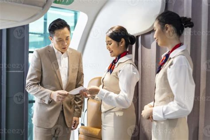 What is the first thing to do when boarding a plane?