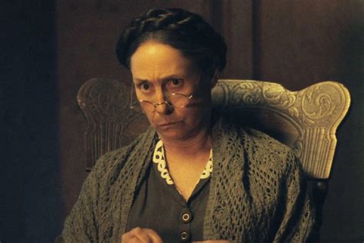 What secret did Laurie tells Jo after she took her stories to the newspaper?