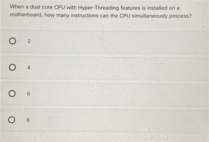 When a dual core CPU with Hyper-Threading features is installed on a motherboard how many instructions can the CPU simultaneously process?