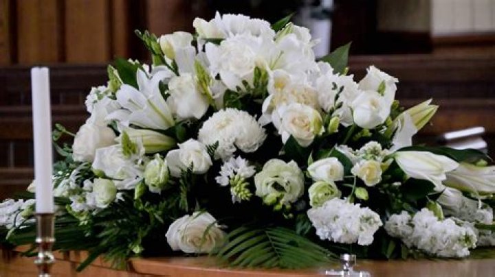 Why are flowers used at funerals?
