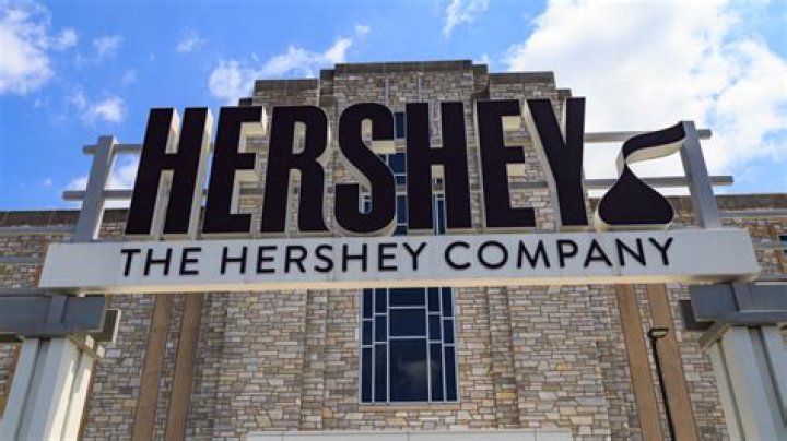 Why didn't Milton Hershey go on the Titanic?