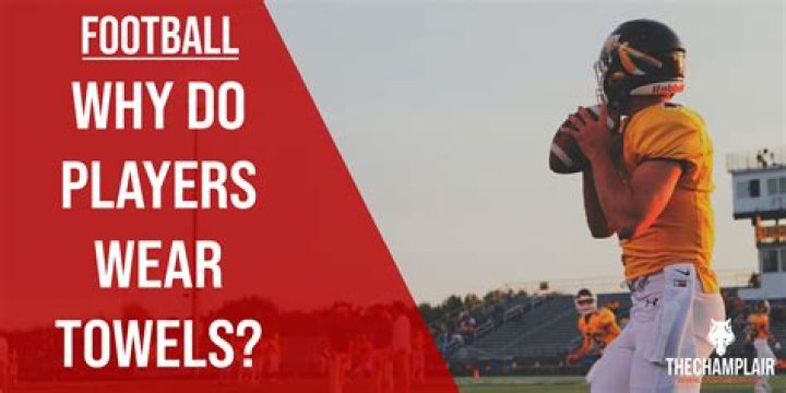 Why do football players wear towels on their pants?