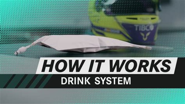 Why do Formula 1 drivers drink through long straws?