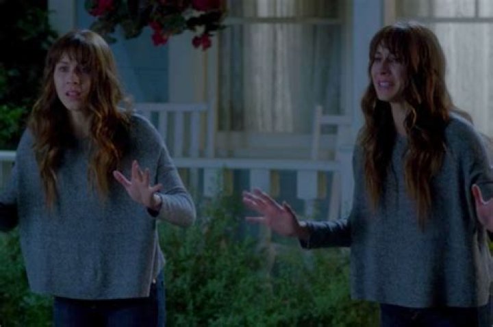 Why was Spencer's twin adopted?